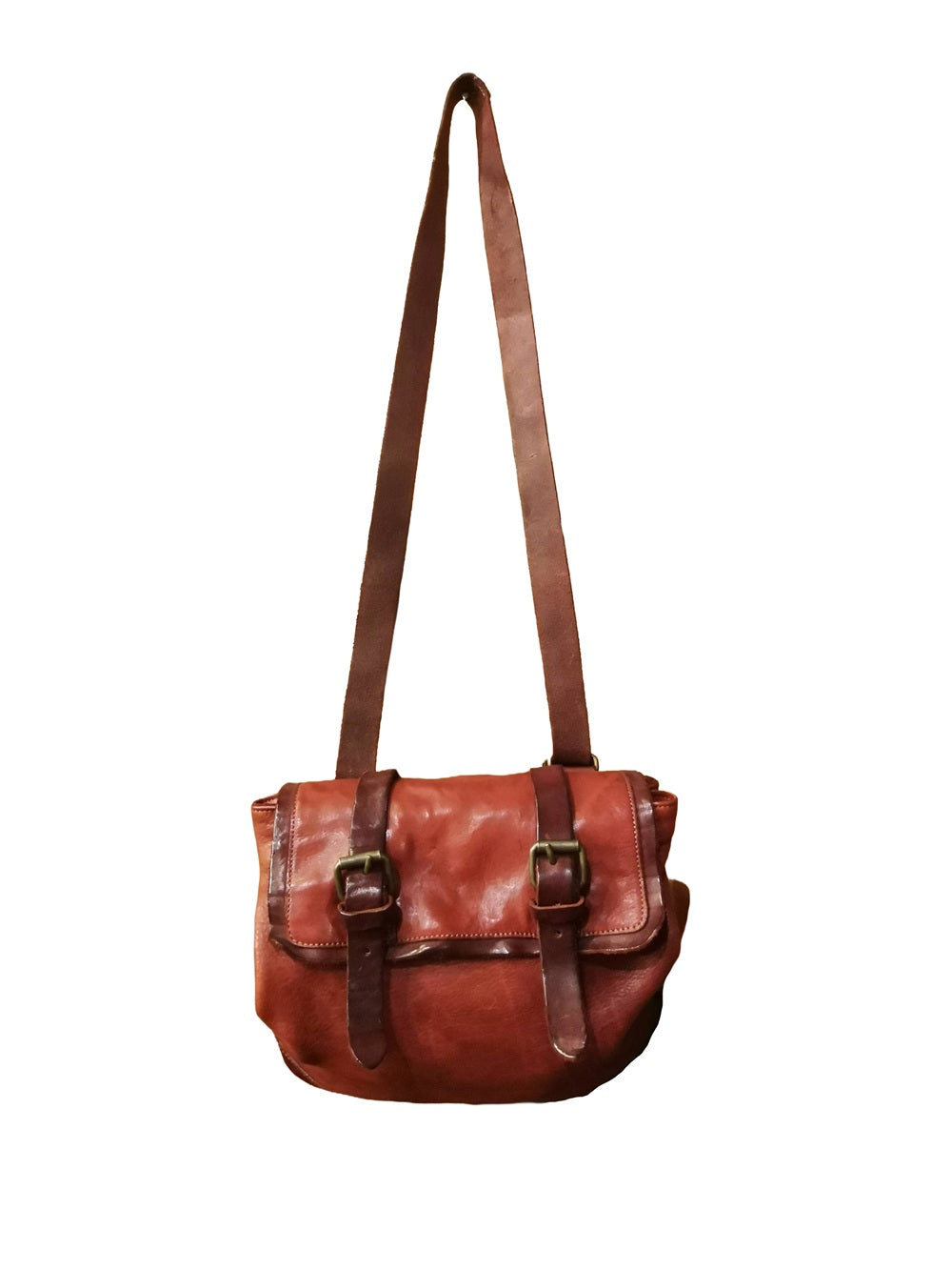 Borsa che si trasforma e diventa zaino, interamente realizzata in morbida pelle. Made in Italy