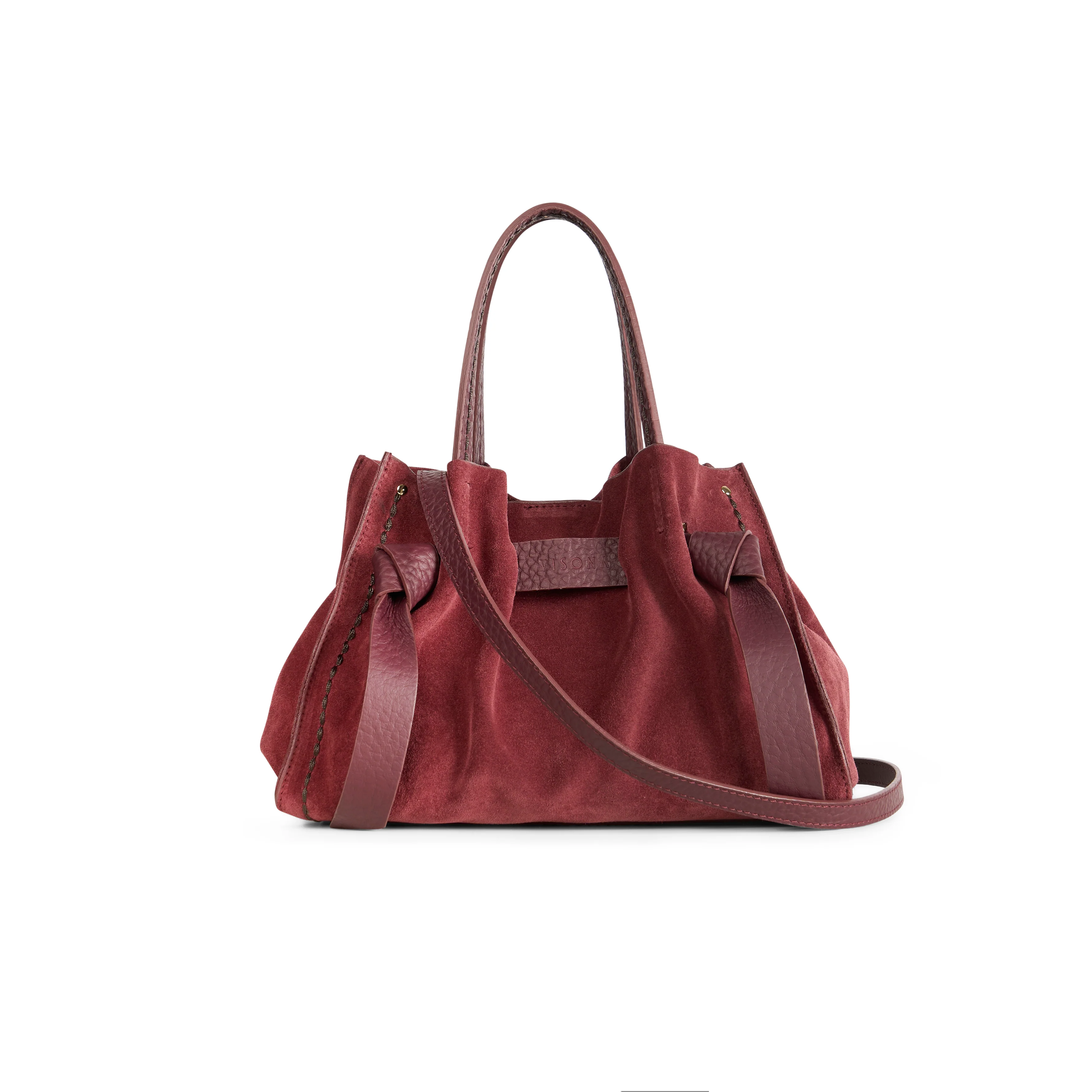 Borsa a mano di piccole-medie dimensioni con fiocchetti in pelle regolabili e tasca interna con zip. 100% Made in Italy.
