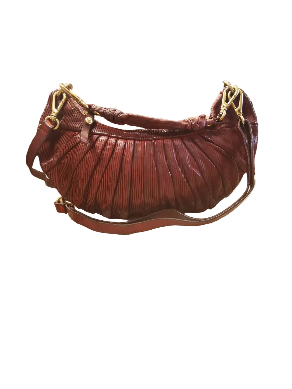 Borsa a forma di mezza luna, con una tracolla lunga e regolabile, e una piccola, entrambe staccabili e intercambiabili. Made in Italy