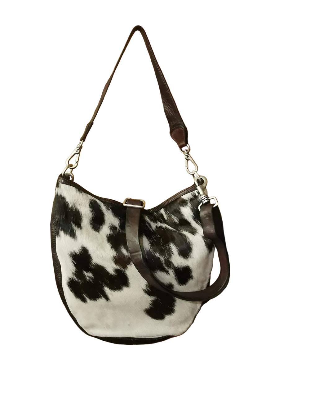 Borsa monospalla realizzata interamente in pelle e pelle di vacchetta a pelo, con doppia tracolla una corta e una lunga, entrambe staccabili. Made in Italy
