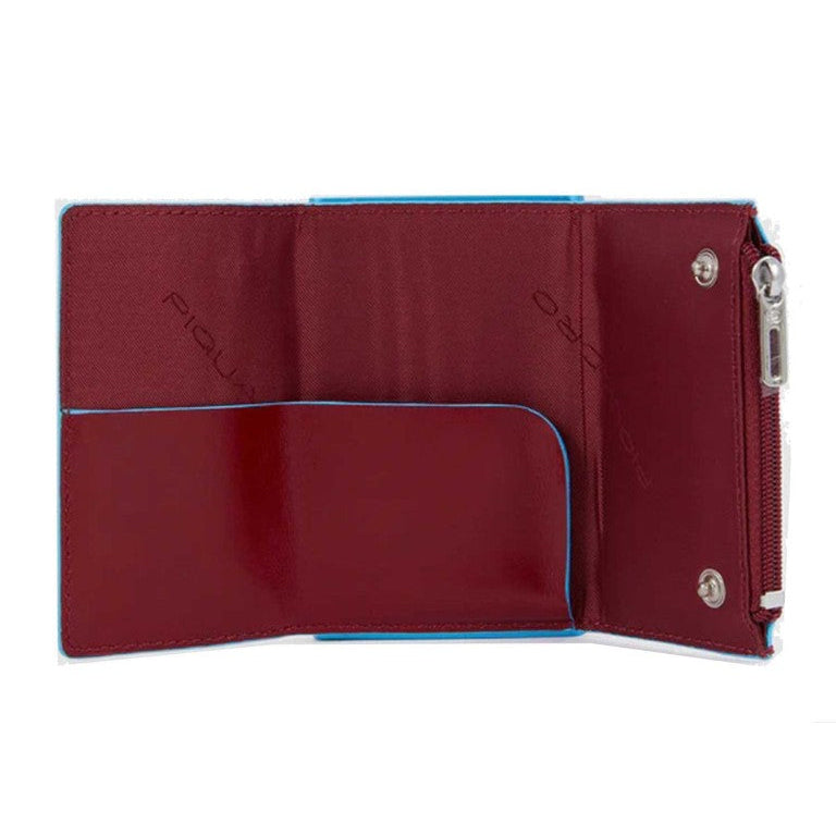 Portafoglio compatto, porta carte con pratica tasca con zip in cui riporre le monete, di Piquadro. Piccolo, leggero, realizzato in morbida pelle con case in alluminio e protezione RFID.