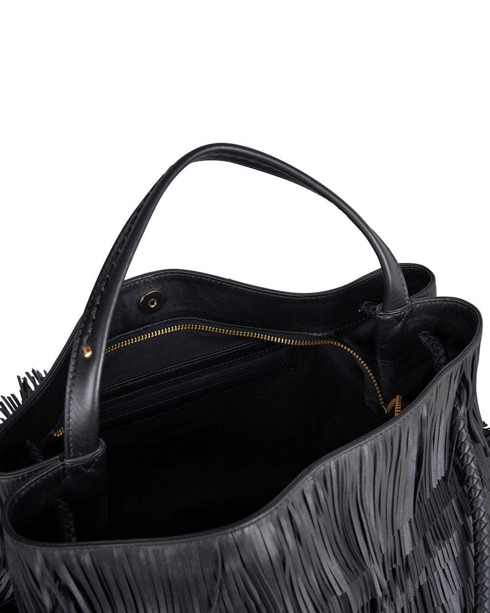 Borsa grande in pelle, ricoperta di frange. Piccola maniglia più due grandi, fisse. Made in Italy