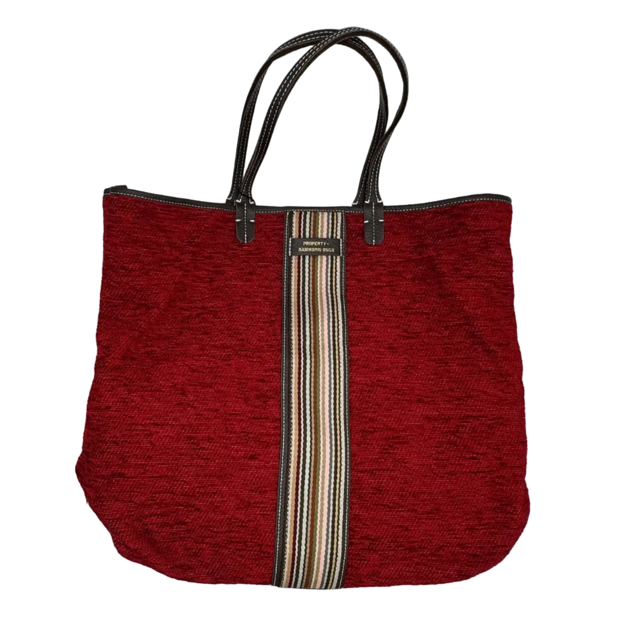 Shopper in tessuto tinta unita, con banda centrale multicolor e classica scritta MANIKOMIO, con borsetta interna staccabile.