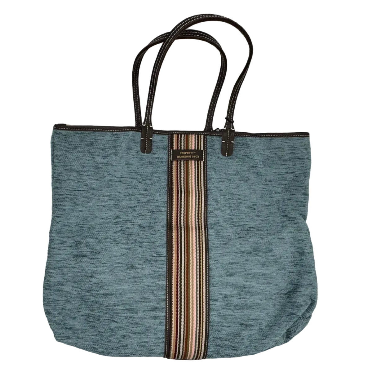 Shopper in tessuto tinta unita, con banda centrale multicolor e classica scritta MANIKOMIO, con borsetta interna staccabile.
