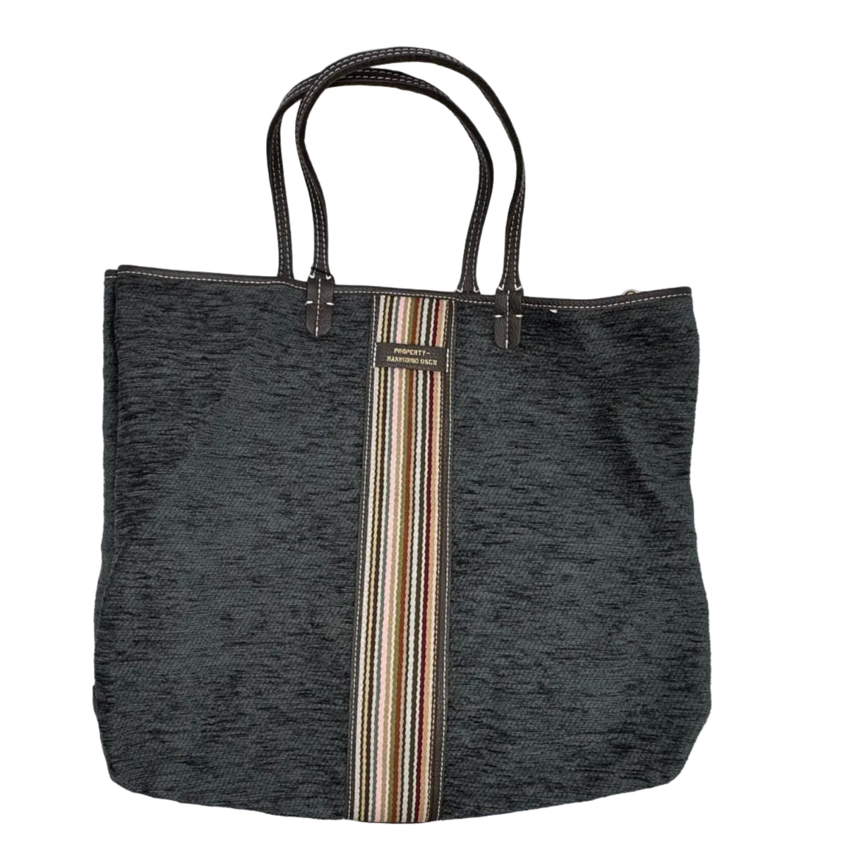 Shopper in tessuto tinta unita, con banda centrale multicolor e classica scritta MANIKOMIO, con borsetta interna staccabile.